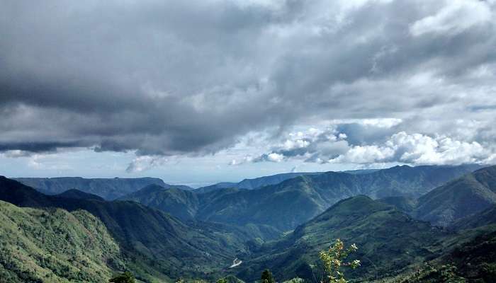 Lush green forest views of the surrounding hills near Shillong Peak, among the best places to visit in India with family