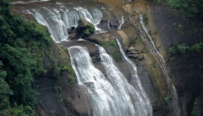 A close-up view of Nohsngithiang Falls, a seven-segmented waterfall located in the East Khasi Hills district in Meghalaya, India.