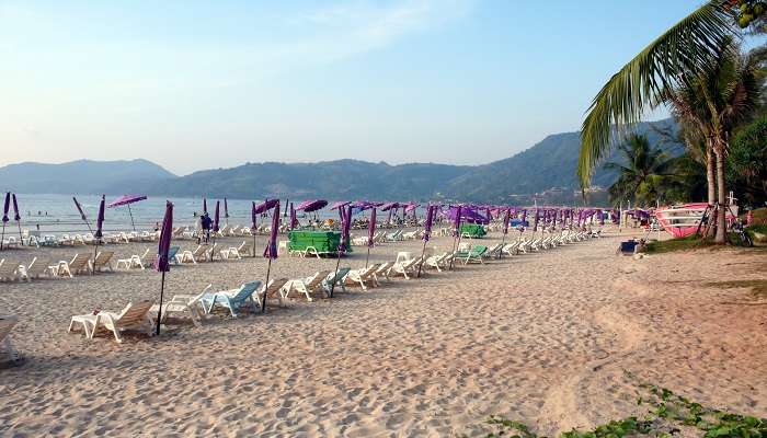 Patong Beach with clear skies and gentle waves in October