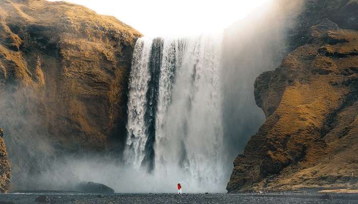 Admire the waterfall cascading down near Manyam Viewpoint