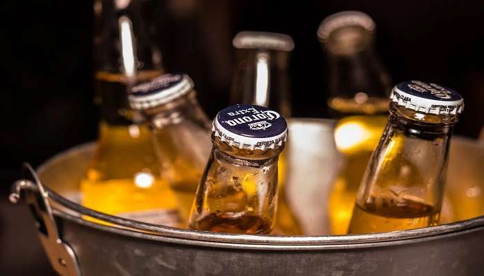 Bucket of bottles on the table