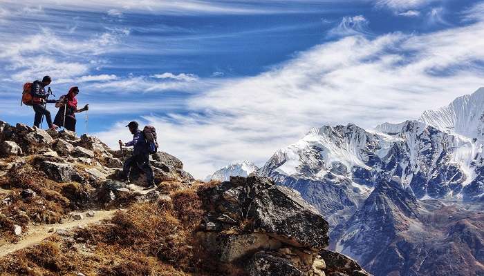 Trekkers on the Himalayas at Gurso Bugyal.