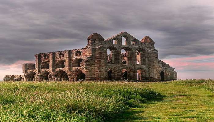 Old Church Building Under Cloudy Sky