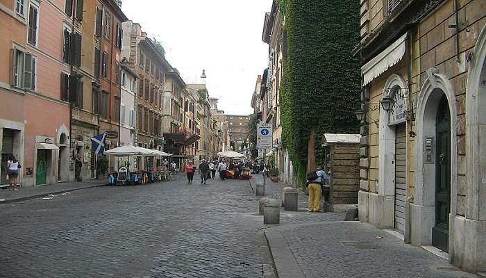 People Chilling at the local restaurant of Borgo Pio Street.