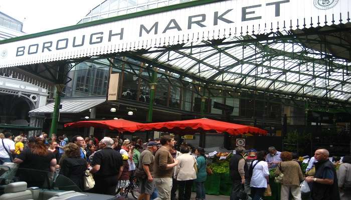  Busy entrance of Borough Market with a crowd of visitors