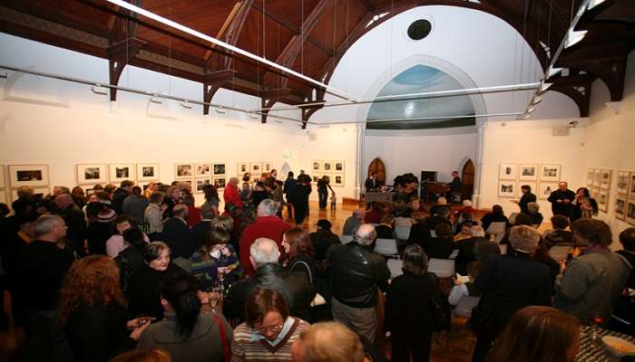 People admiring the art at Devonport Regional Gallery