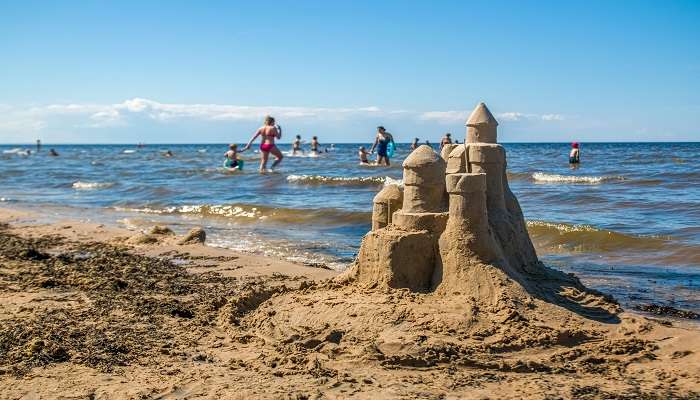 Sandcastle built on the Oreti beach on a sunny day