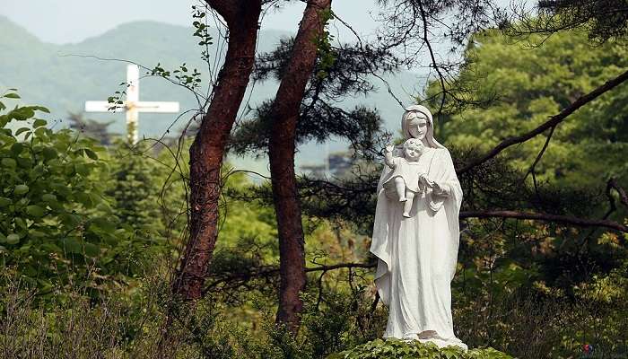 A statue of Virgin Mary and child Jesus