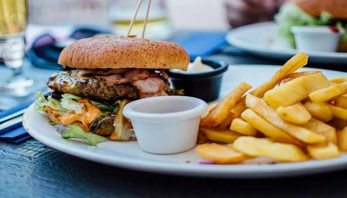 Fries and burgers on a plate