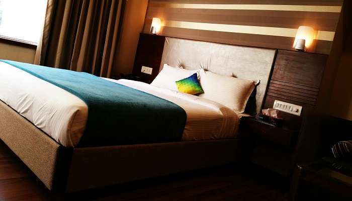 A room with a size bed in one of the premium hotels in Domlur.