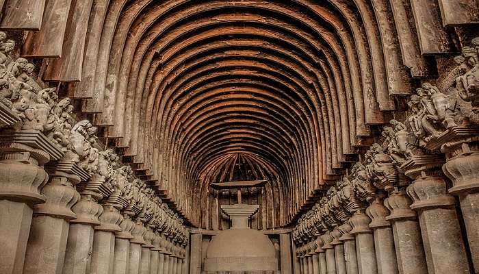 The original Buddhist Karla caves near Kune Falls.