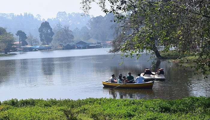 People enjoying boating in Kodaikanal Lake