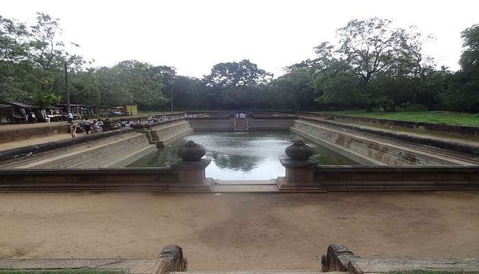 the wide-angle view of the ancient Kuttam Pokuna