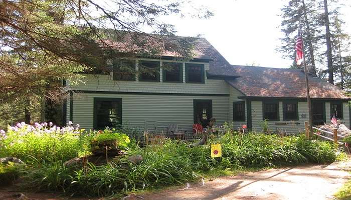 Stunning outer view of the lodge cuddled up in the serene forests.