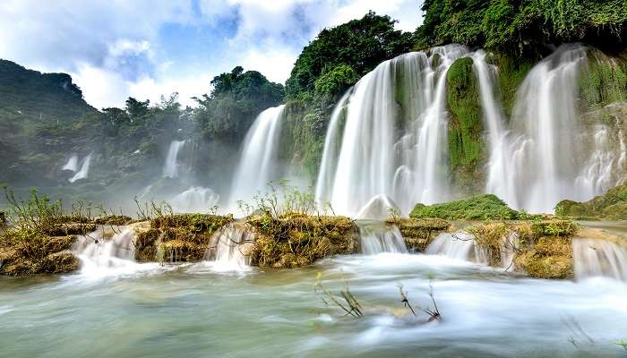 Beautiful view of Paglajhora Waterfall cascading down the rocky cliffs