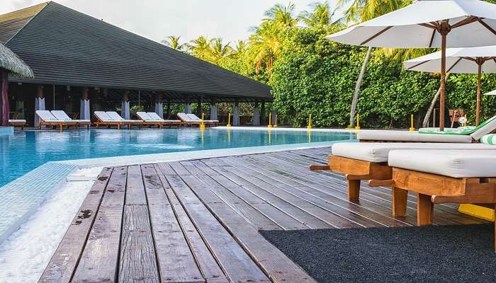 Poolside view with loungers on a sunny day