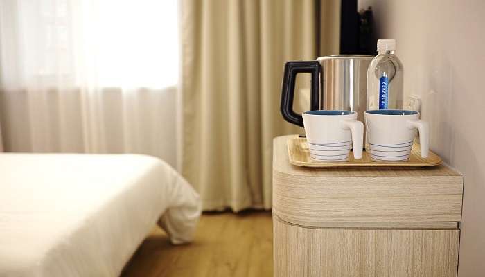 Tea-coffee machine in a hotel room , best Hotels In Guindy 