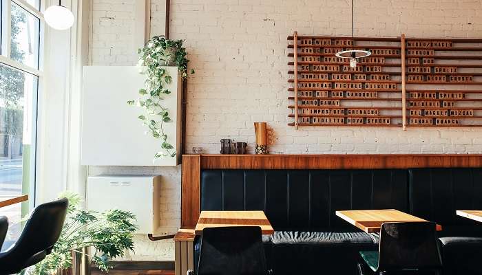 People Sitting on the Chairs inside the best cafes in Wagga Wagga.