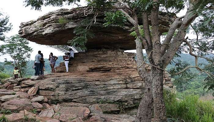 Gigantic rocks shaped like an umbrella, a top attraction nearby Randha falls.