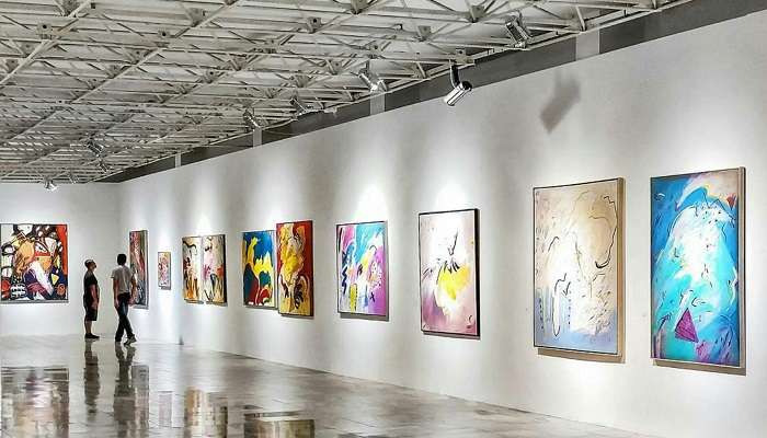 colorful arts hanging on wall