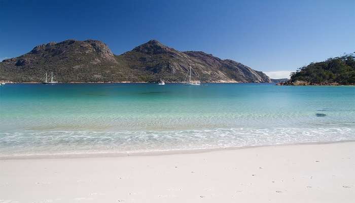 Walkway leading to the lookout at Wineglass Bay in Freycinet National Park Australia, showcasing the stunning natural beauty and clear waters.