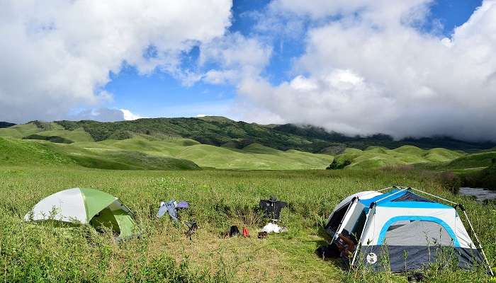 Camping tents amidst the lush green valleys to stay at the best hotels in Lambasingi. 