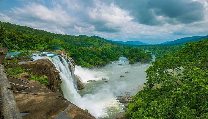 A serene view of the waterfall near the Peechi Vazhani Wildlife Sanctuary.