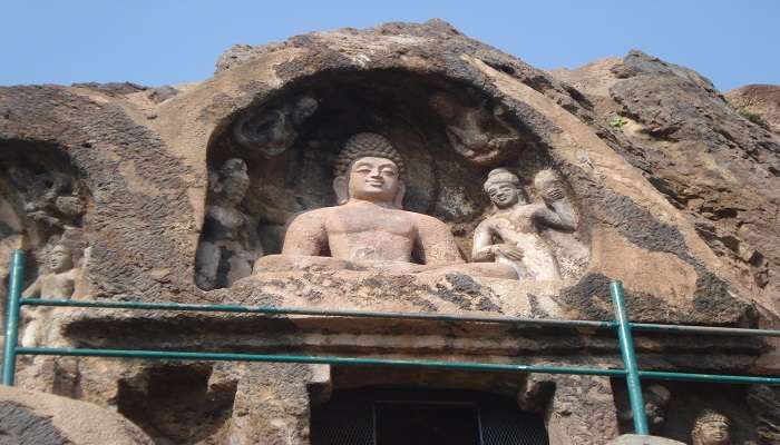 The statue of the sitting Buddha at the entrance to the cave at Bojjannakonda 