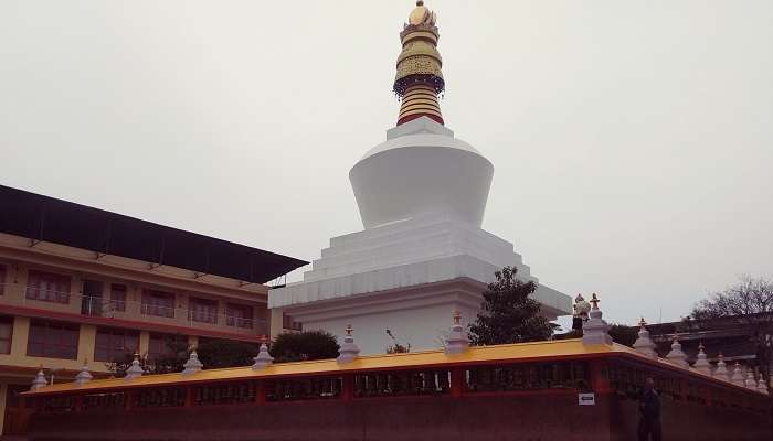 he Top of the Do Drul Chorten engraved with Vajra Kilaya, near Seven Sisters Waterfalls