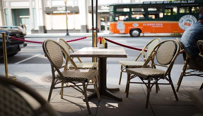  Table and chairs by the street 