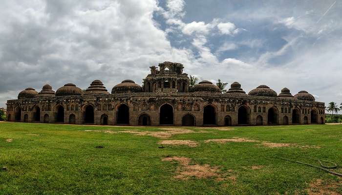 Lush green landscape at Elephant Stables, one of the best places to visit near Hampi. 