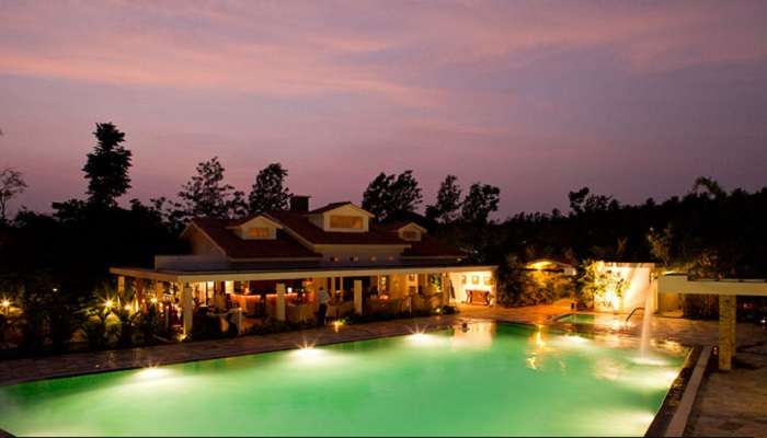 Nighttime lighting at the resort, a tranquil escape among Courtallam resorts. 