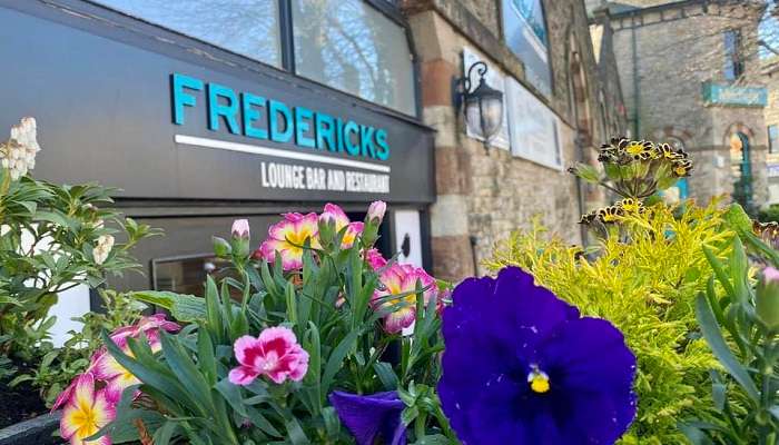 Beautiful flowers in the exterior view of the bar, Pubs in New Plymouth