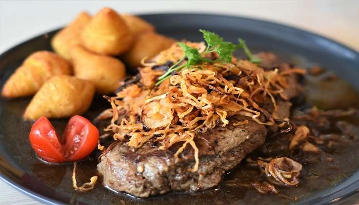 A premium steak dish with sides to try at the top Restaurants in Tamworth.