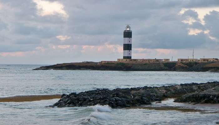 Kacchi Adh Lighthouse, positioned near Shivrajpur Beach