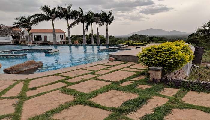  Swimming pool with nature’s backdrop. 