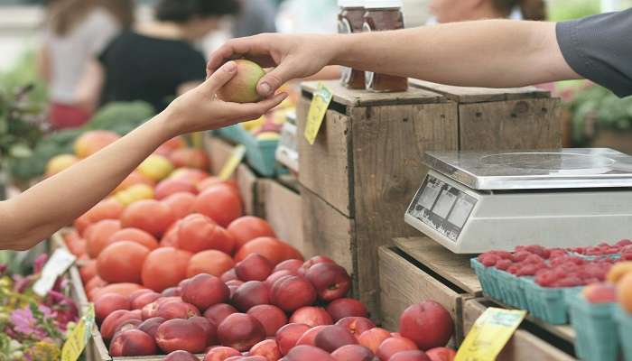 Discover this fruit stall at Sindu Market and acquire knowledge about the Le Mayeur Museum Entry Fee