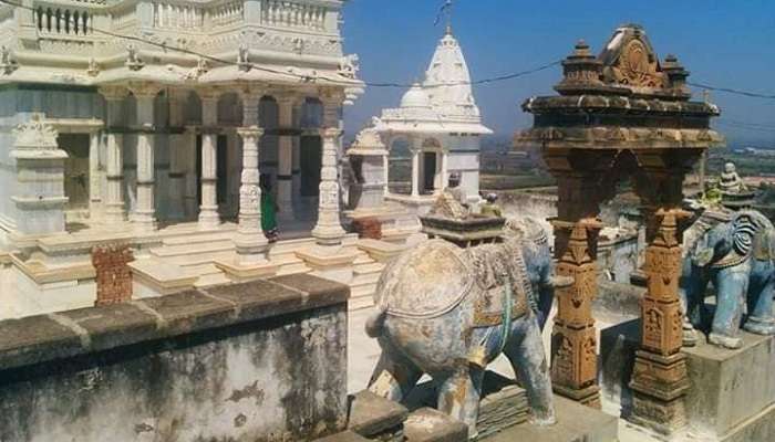 Greenery surrounded at Talaja Shwetambar Jain Derasar near the Gopnath Beach.