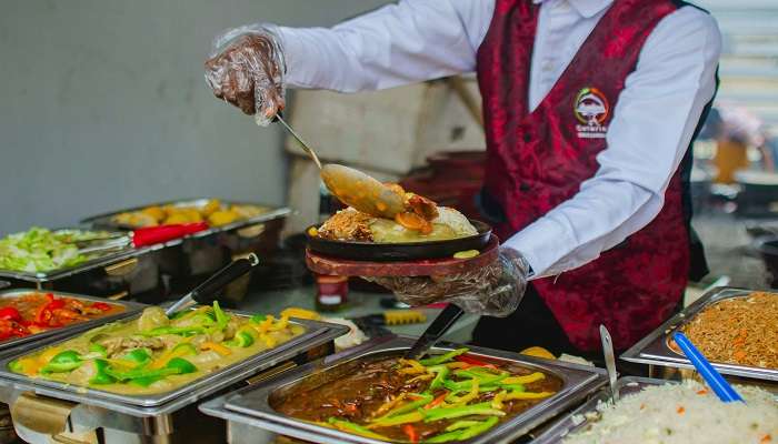 A Chef Putting Food on a Plate to try at the top Restaurants in Geraldton.