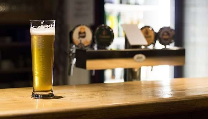 A glass of beer on the table