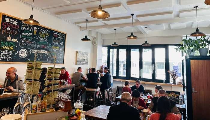 People enjoying beer at The Sprig & Fern Tavern