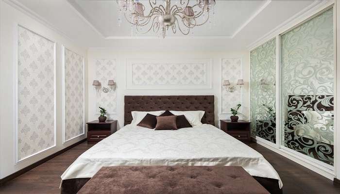 A well-decorated bed in a room at the best hotels in Mylapore.