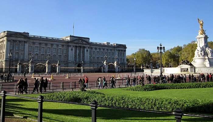 People going to attend an exhibition at Buckingham Palace