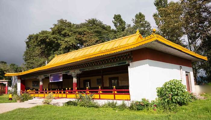 Explore the regal Tsuk La Khang Monastery In Gangtok near the Kabi Lungchok.