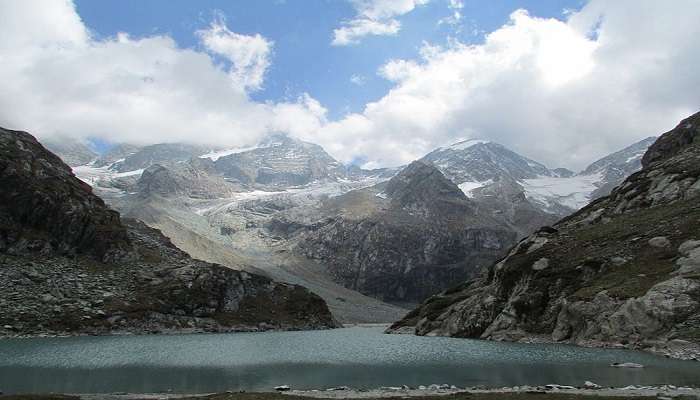 Tulian Lake with its clear blue waters surrounded by rugged mountain peaks and lush greenery is close to Wadiy e Hajan