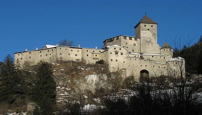 Huge medivial-style fortress situated on the rocks of Ahrntal Valley