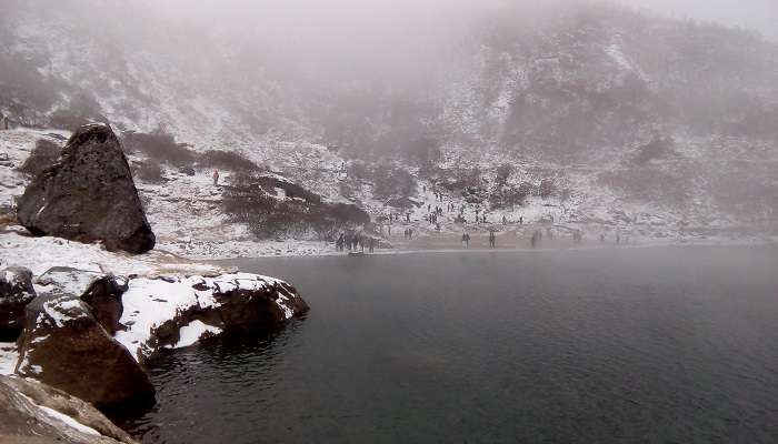 Cholamu Lake Sikkim with mountains covered with snow. 