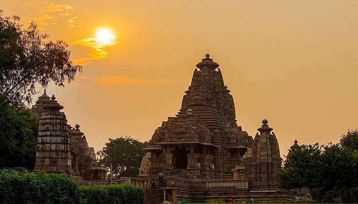 An enchanting sunset view of Kandariya Mahadeva Temple