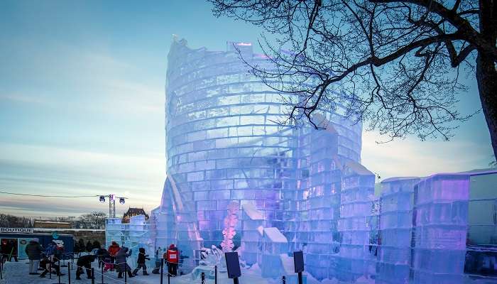 Visit the Bonhomme ice palace during the Quebec winter carnival