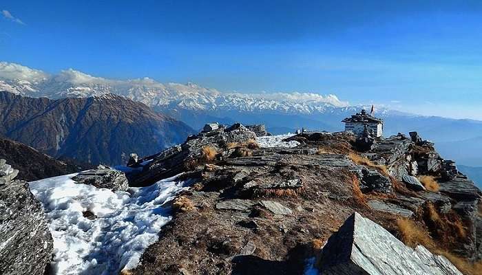 the view of mighty himalayas as seen from chandrashila peak a best place to visit in Tungnath in december.